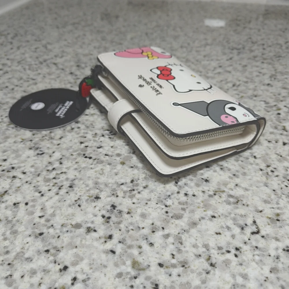 Hello Kitty And Friends X Kate Spade New York Medium Bifold Wallet - Picture 5 of 8